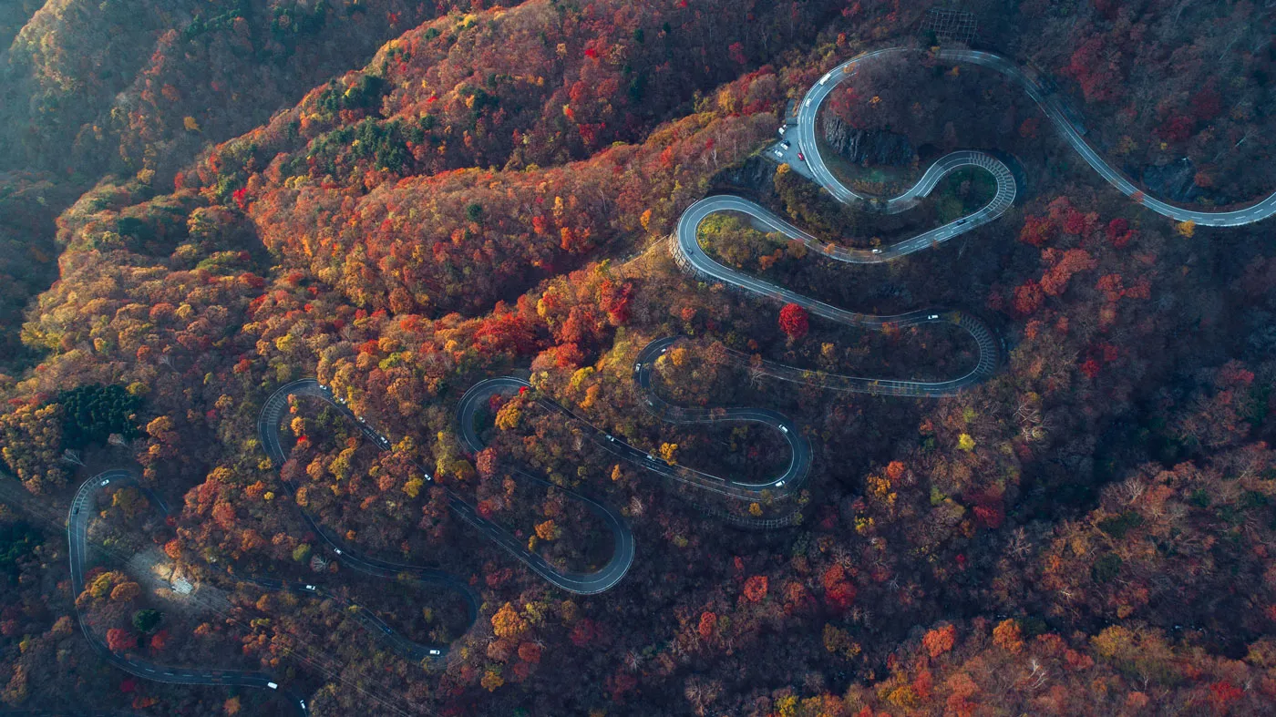 Beautiful curvy street on the Nikko mountain, Japan. Aerial view