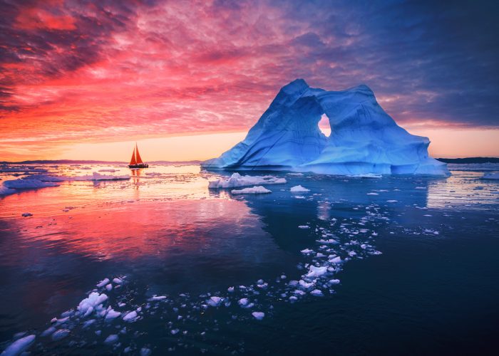 Boat sailing during the Midnight sun, Greenland