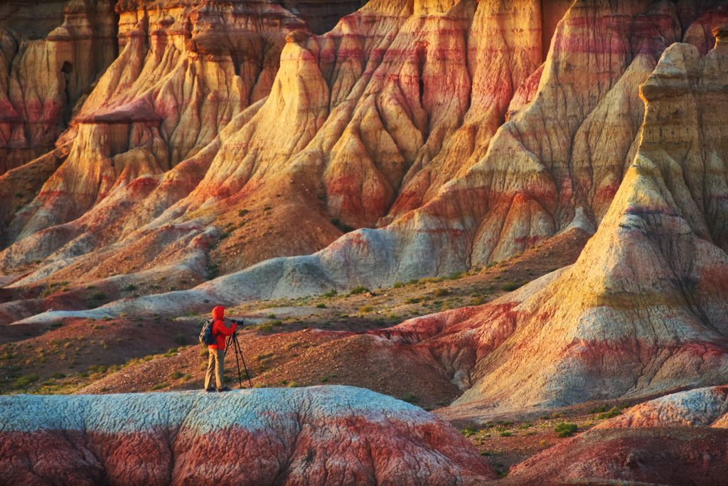 travel photographer in Mongolia Gobi Desert during sunset