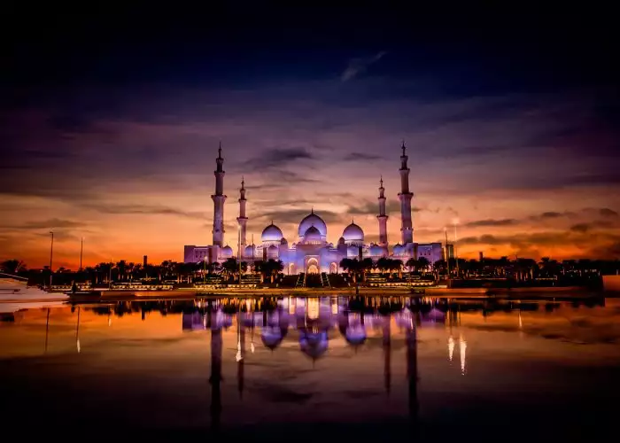 Illuminated Mosque At Night